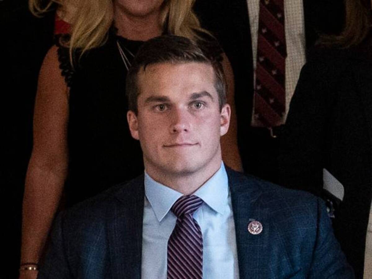 Rep. Madison Cawthorn (R-N.C.) proceeds to the Senate chamber with other Republicans to oppose new mask guidance on July 29, 2021. (Jabin Botsford/The Washington Post)