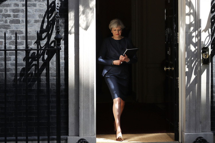 Theresa May speaks to Britain a few hours ago from 10 Downing Street in London. She called a general election for the United Kingdom to be held on June 8. (Dan Kitwood/Getty Images)</p>  