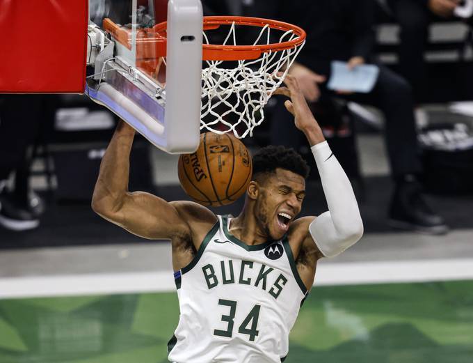 Milwaukee forward Giannis Antetokounmpo averaged 23.5 points as the Bucks swept the Miami Heat. (Jeffrey Phelps/AP)
