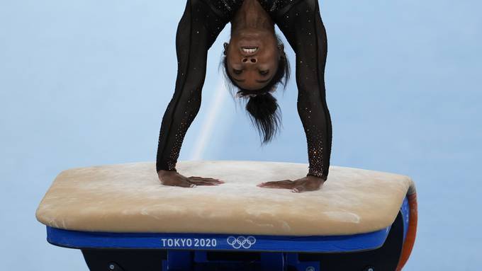Biles trains on the vault for the 2020 Summer Olympics. (Natacha Pisarenko/AP)
