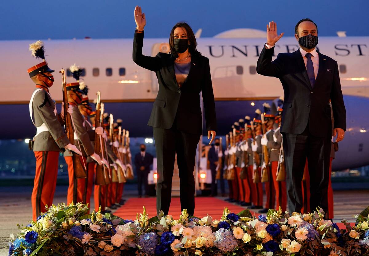 Vice President Harris and Guatemala's Minister of Foreign Affairs Pedro Brolo wave at her arrival ceremony in Guatemala City on June 6, 2021. (Jacquelyn Martin/AP Photo, File)