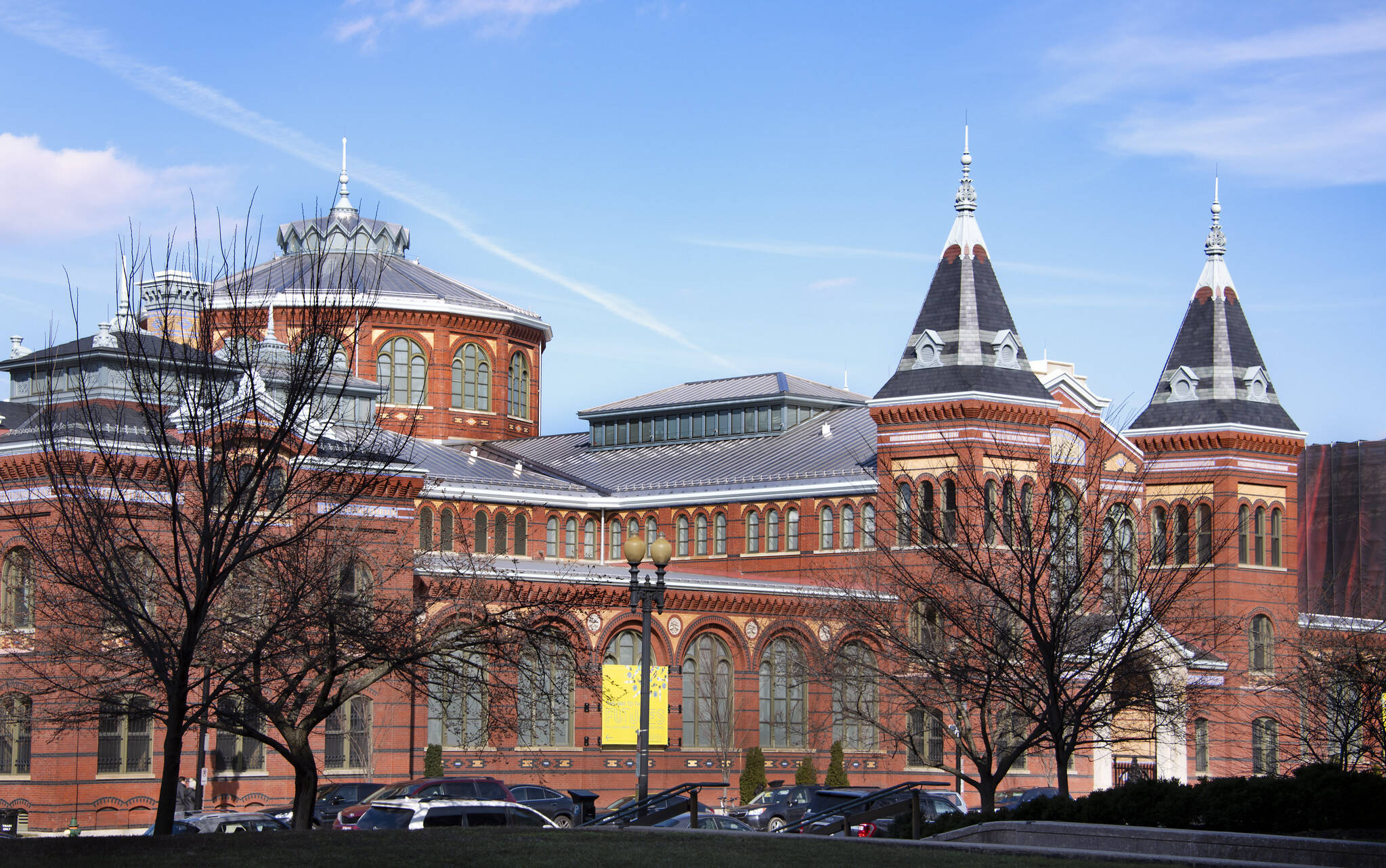 Blue skies and wispy clouds above the Arts and Industries Building in D.C. on Saturday. (CTB in DC/Flickr/CTB in DC)