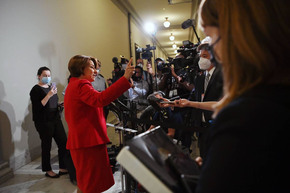 Sen. Amy Klobuchar (D-Minn.) speaks to reporters as Facebook whistleblower Frances Haugen testifies before the Senate on Oct. 5. (Matt McClain/The Washington Post)