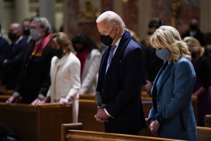 Biden and first lady Jill Biden attend Mass at the Cathedral of St. Matthew the Apostle on Inauguration Day. (Evan Vucci/Associated Press)