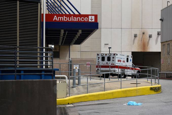 An ambulance arrives at a Texas hospital. (Callaghan O'Hare/Reuters)