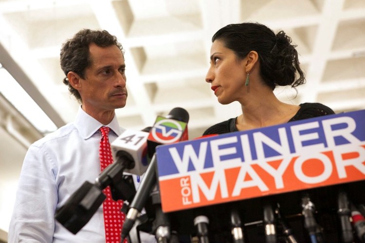 Then-New York mayoral candidate Anthony Weiner and his wife Huma attend a news conference in 2013. (Eric Thayer/Reuters)</p>