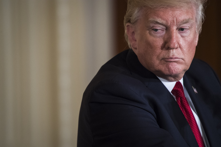 Trump sits in the East Room of the White House. (Jabin Botsford/The Washington Post)</p>  