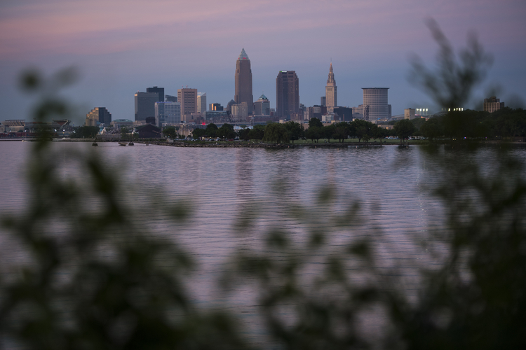The sun sets on Cleveland, Ohio. (Jabin Botsford/The Washington Post)</p>  