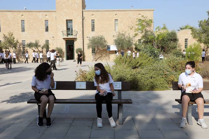 Students wearing face masks on the first day of the school year at Acropolis Middle School in Nicosia, Cyprus. (Katia Christodoulou/EPA)