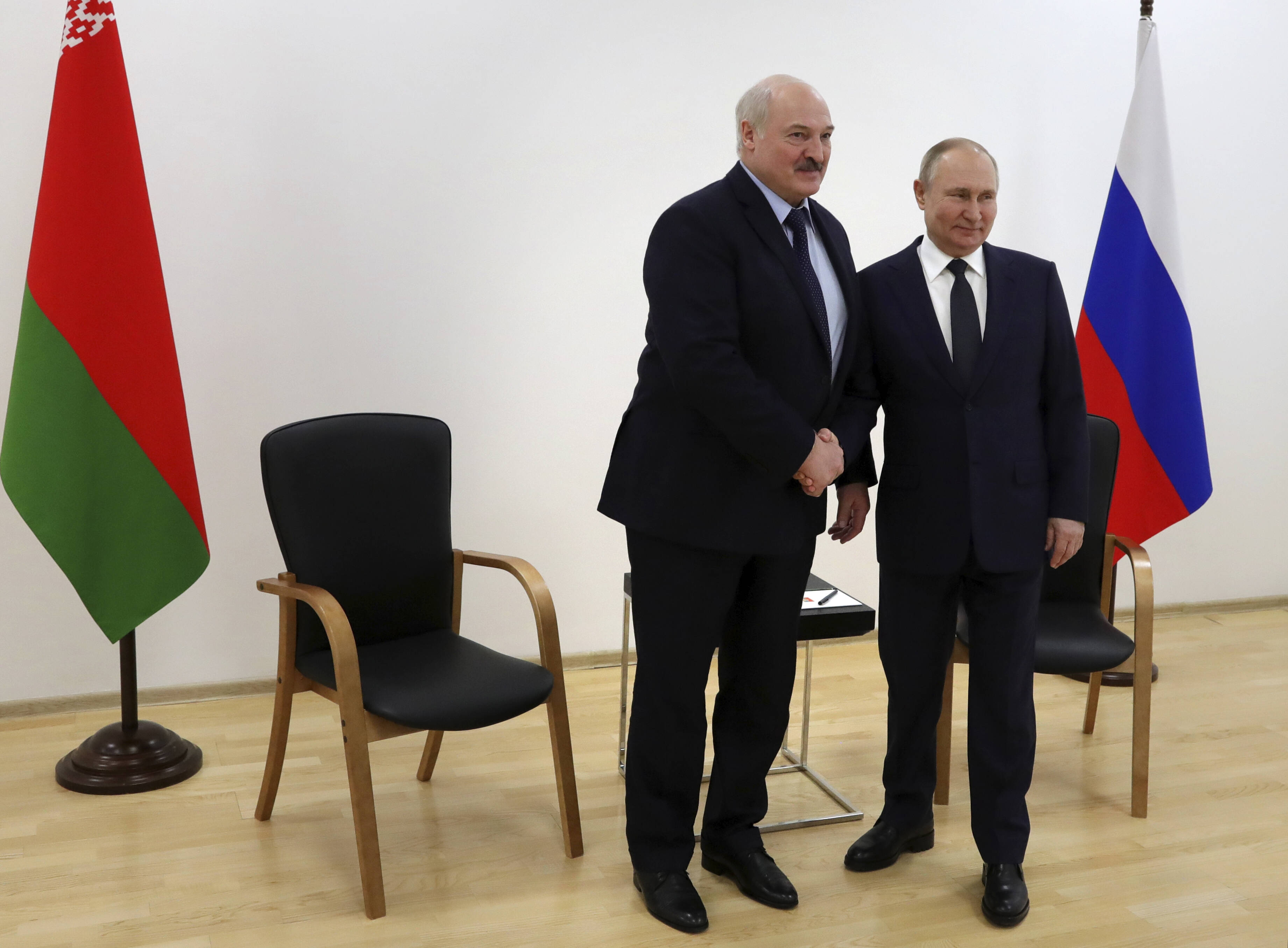 Belarusian President Alexander Lukashenko and Russian President Vladimir Putin during their meeting outside of Tsiolkovsky, Russia, on April 12. (Mikhail Klimentyev/AP)
