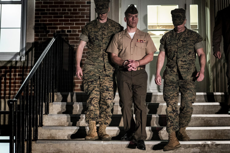Mark Thompson is escorted last night from his court-martial at Quantico. (J. Lawler Duggan/For The Washington Post)</p>  