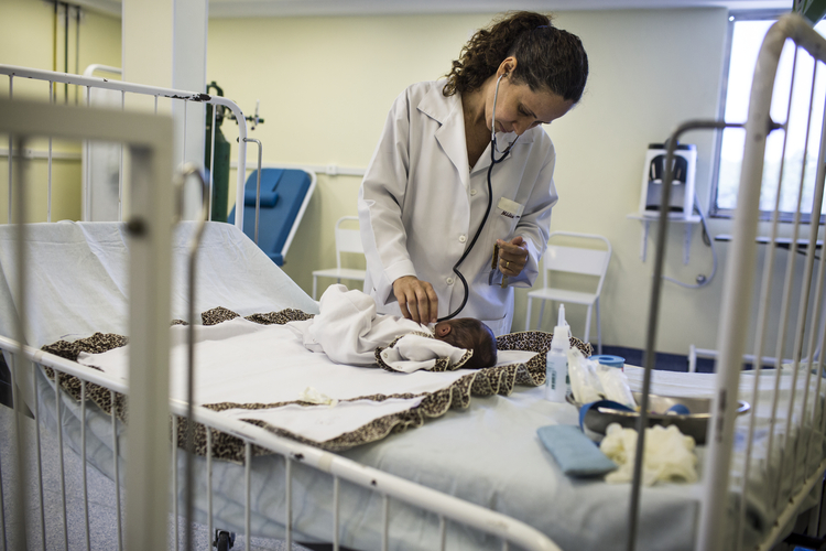 Cristiane Facio, an&nbsp;ematogist and mother of two,&nbsp;checks a baby at a hospital in Rio. She&nbsp;tested positive for zika in her third trimester. Luckily,&nbsp;after an ultrasound, there were no symptoms of microcephaly. (Lianne&nbsp;Milton/Panos Pictures for The Washington Post)</p>  