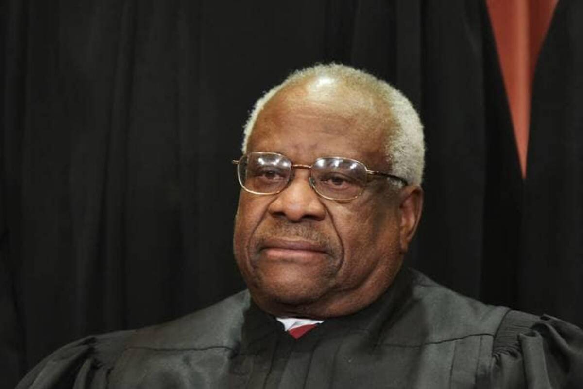 Justice Clarence Thomas was one of three justices to dissent from the high court's ruling on the Navy vaccination case. (Mandel Ngan/Getty Images)