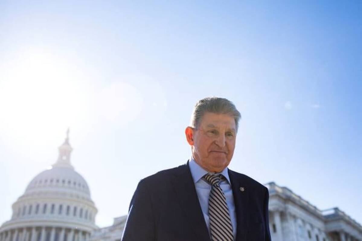 Sen. Joe Manchin (D-W.Va.) exits the U.S. Capitol following a vote. (Tom Brenner/Reuters)