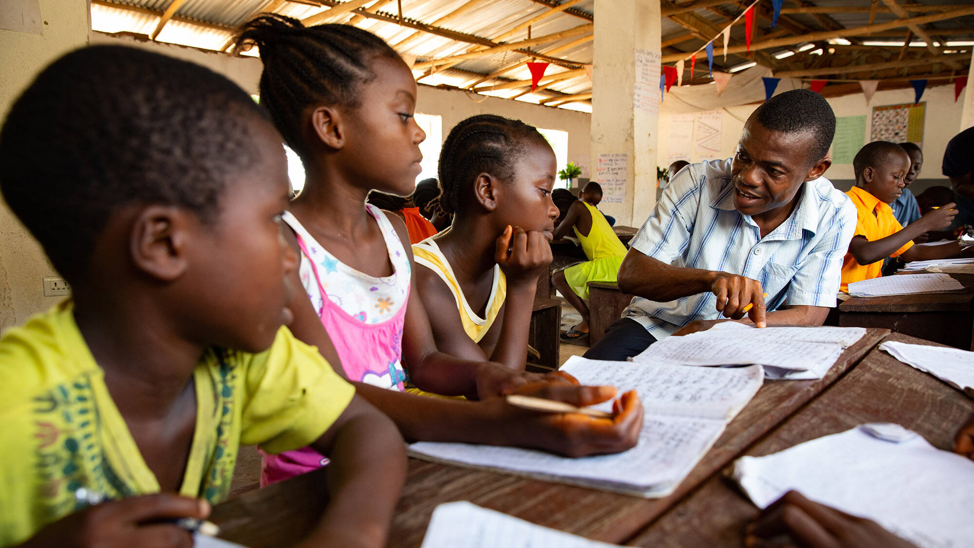 Young scholars in Liberia (Photo courtesy of the Luminos Fund).