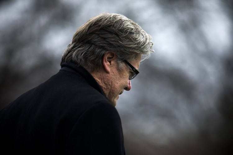 Steve Bannon walks behind Trump at the White House. (EPA/Jim Lo Scalzo)</p>  