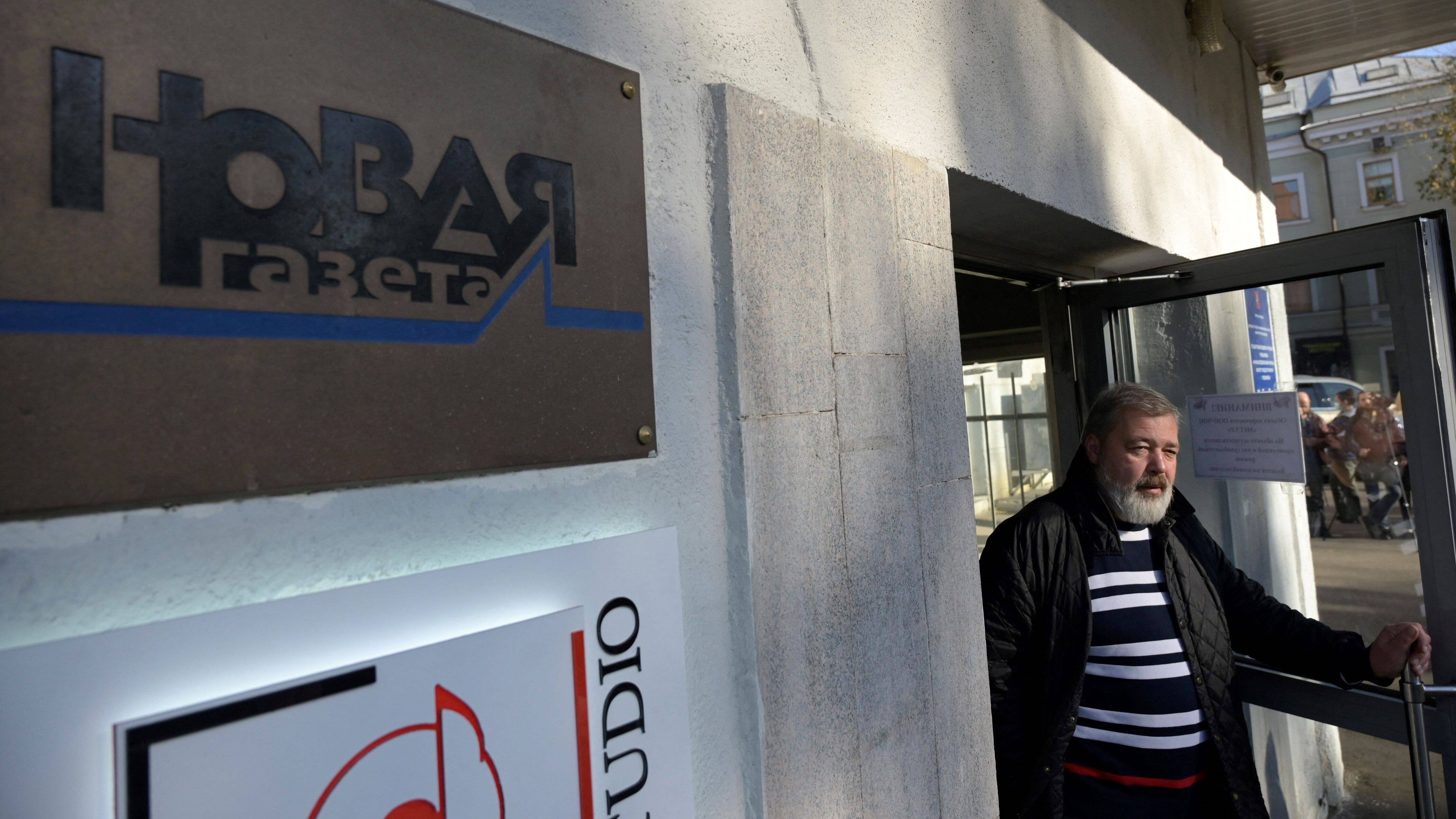 Novaya Gazeta editor in chief Dmitry Muratov is seen at the entrance to the newspaper's office in Moscow on Oct. 7, 2021. (Natalia Kolesnikova/AFP/Getty Images)