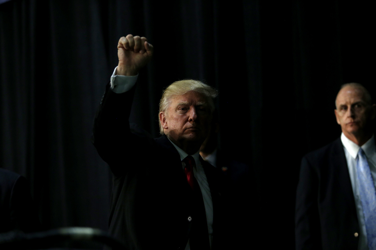 Donald makes his way off stage after his rally last night. (Brian Blanco/Getty Images)</p>