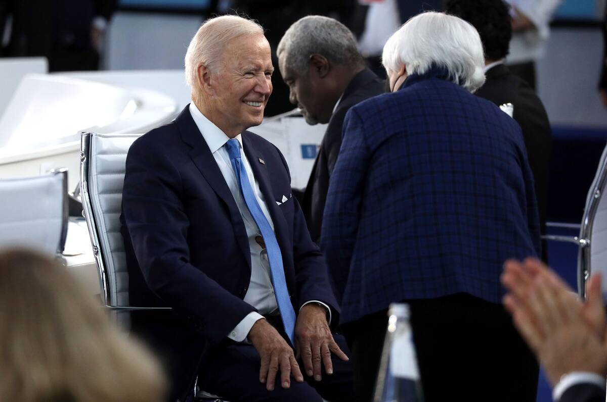 President Biden and Treasury Secretary Janet Yellen speak during the G-20 Summit in Rome on Oct. 30. (Alessia Pierdomenico/Bloomberg)