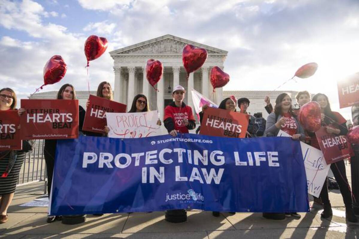 Antiabortion demonstrators rally outside the U.S. Supreme Court on Monday. (Drew Angerer/Getty Images)