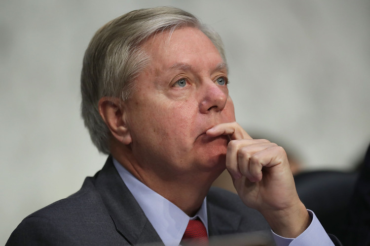Sen. Lindsey Graham listens to witnesses during a&nbsp;Senate Judiciary subcommittee hearing in May. (Eric Thayer/Getty Images)</p>  