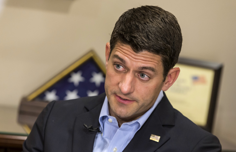 Paul Ryan&nbsp;works&nbsp;in his Janesville, Wis., office&nbsp;yesterday.&nbsp;(AP Photo/Andy Manis)</p>  