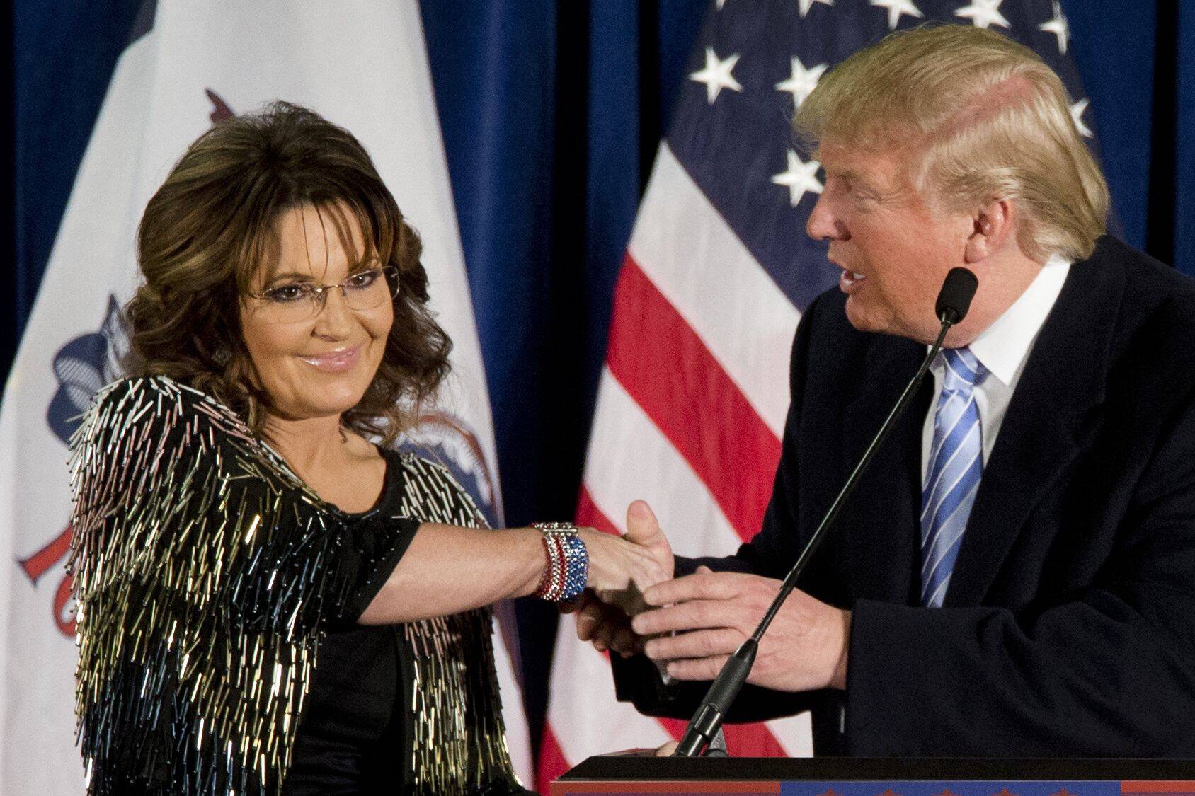 Former Alaska governor Sarah Palin appears with then-presidential candidate Donald Trump at a rally at Iowa State University in 2016. (Mary Altaffer/AP)