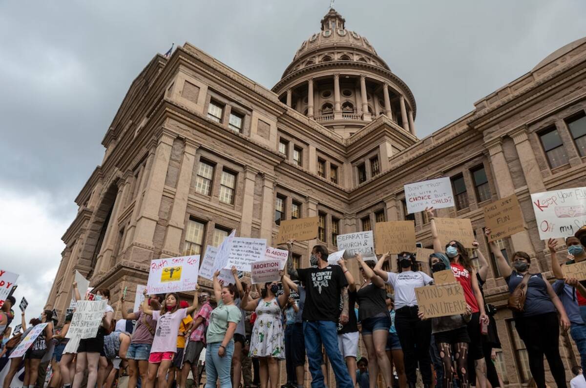 Abortion rights supporters rally in October 2021 outside the Texas Capitol in Austin. A state law that bans nearly all abortions after about six weeks allows citizens to sue to enforce it. (Stephen Spillman/AP)