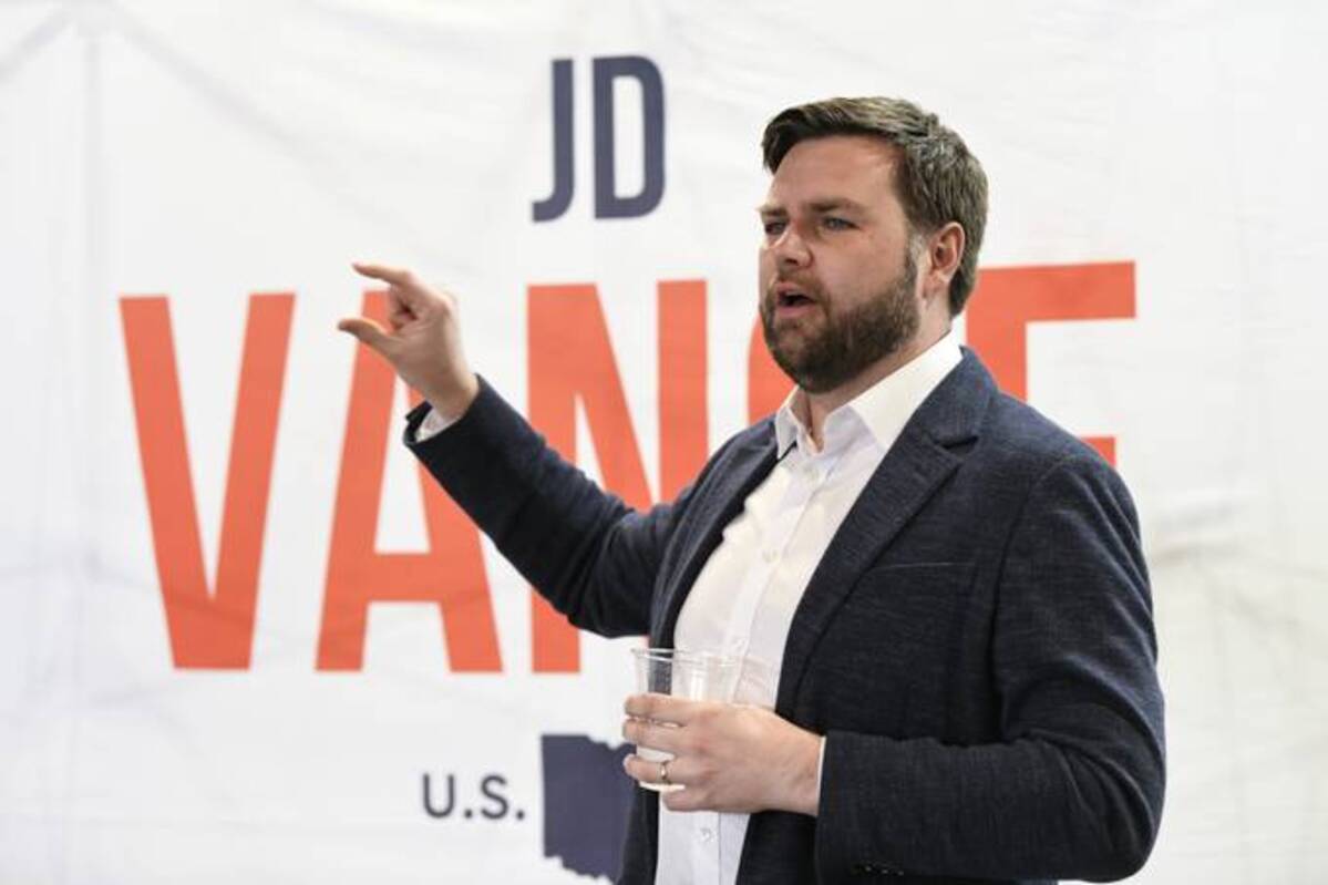 Senate candidate J.D. Vance speaks with prospective voters on the campaign trail on Monday in Troy, Ohio. (Gaelen Morse/Getty Images)