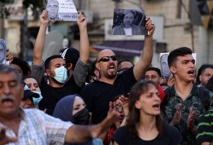 Palestinians protest the death of activist Nizar Banat while in the custody of Palestinian Authority security forces, in Ramallah on June 27. (Photo by Abbas Momani/AFP via Getty Images)