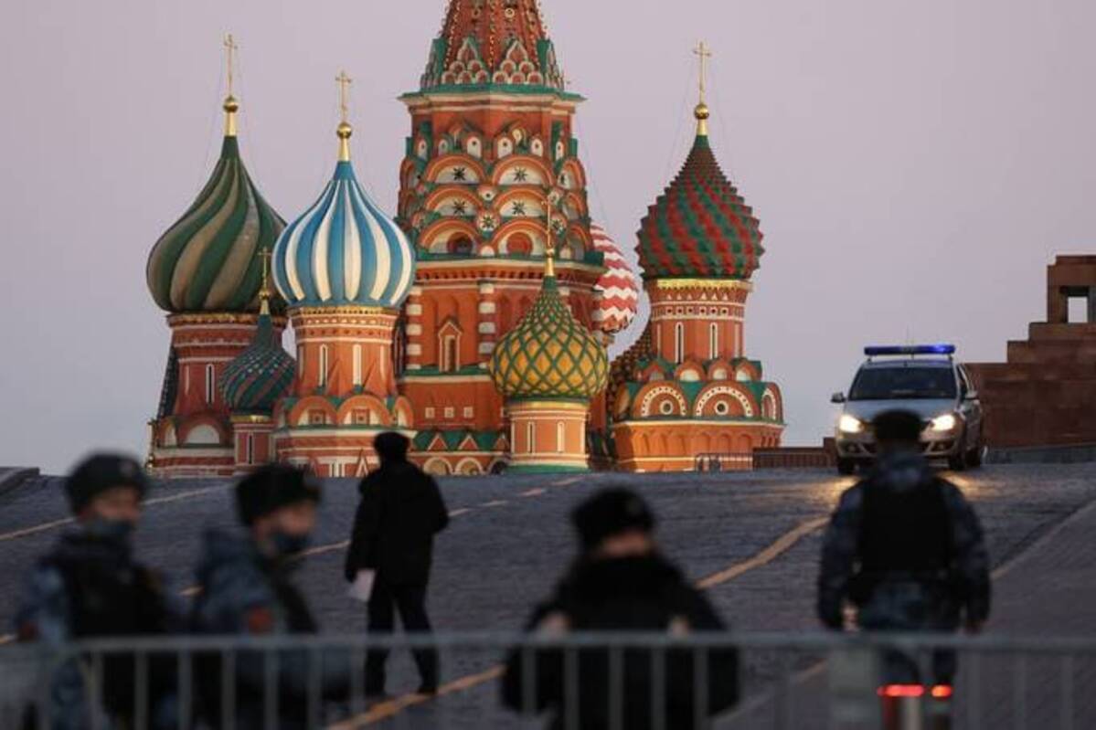Soldiers from the Russian National Guard patrol the area surrounding Saint Basil's Cathedral on Red Square in Moscow on Feb. 24. (Andrey Rudakov/Bloomberg News)