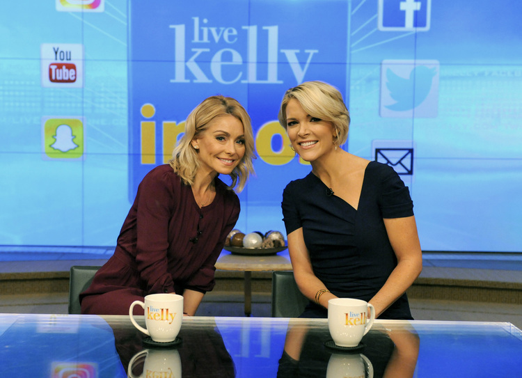 Kelly Ripa poses with guest co-host, Fox News' Megyn Kelly, during the production of "Live Kelly" in New York on Wednesday. (Pawel Kaminski/Disney/ABC Home Entertainment and TV Distribution via AP)</p>  