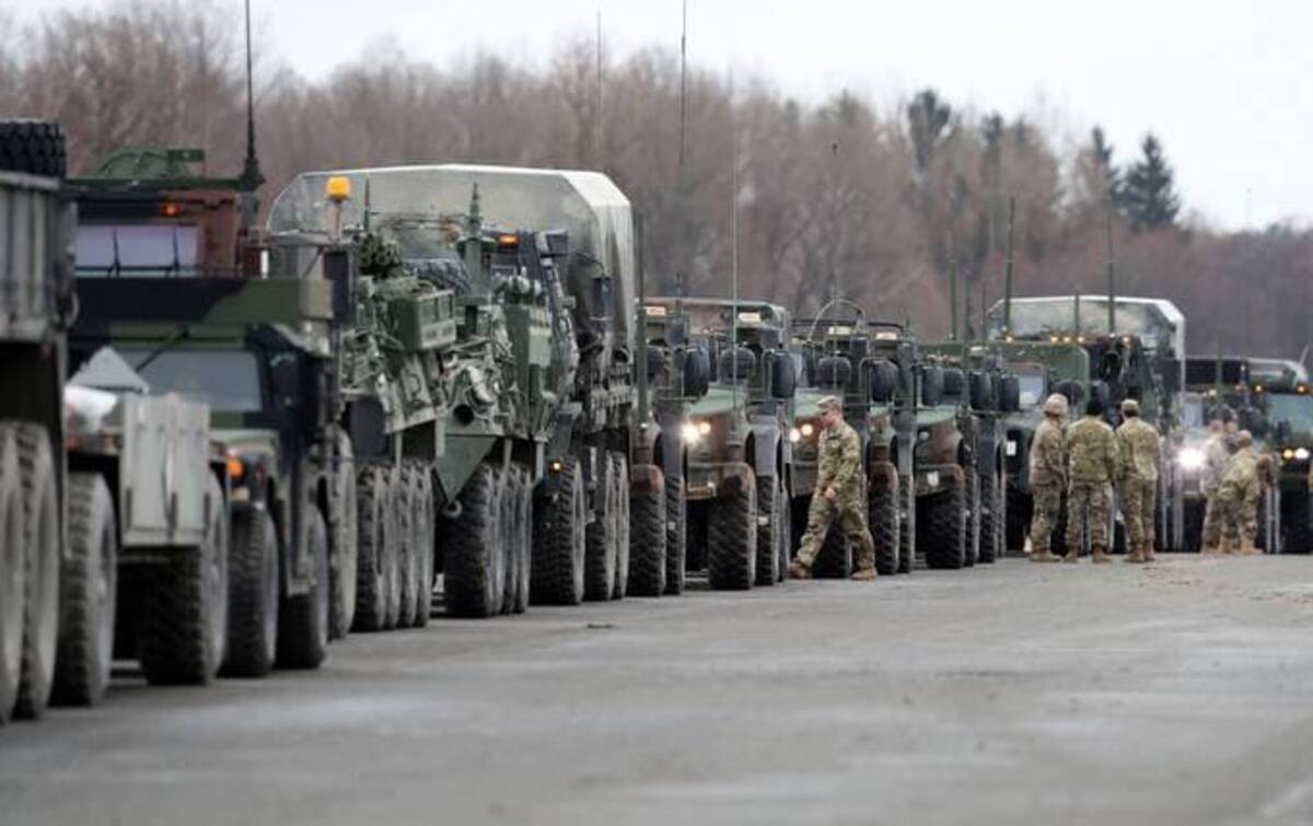 The U.S. Army prepares armored combat vehicles before deploying to Romania on Feb. 9 from Germany. (Alexandra Beier/Getty Images)