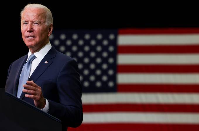 President Biden delivers remarks on his proposed American Families Plan legislation at McHenry County College in Crystal Lake, Ill., on Wednesday. (Evelyn Hockstein/Reuters)