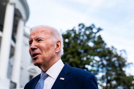 President Biden speaks with the media during his walk to Marine One on the South Lawn of the White House on Friday. (Demetrius Freeman/The Washington Post)