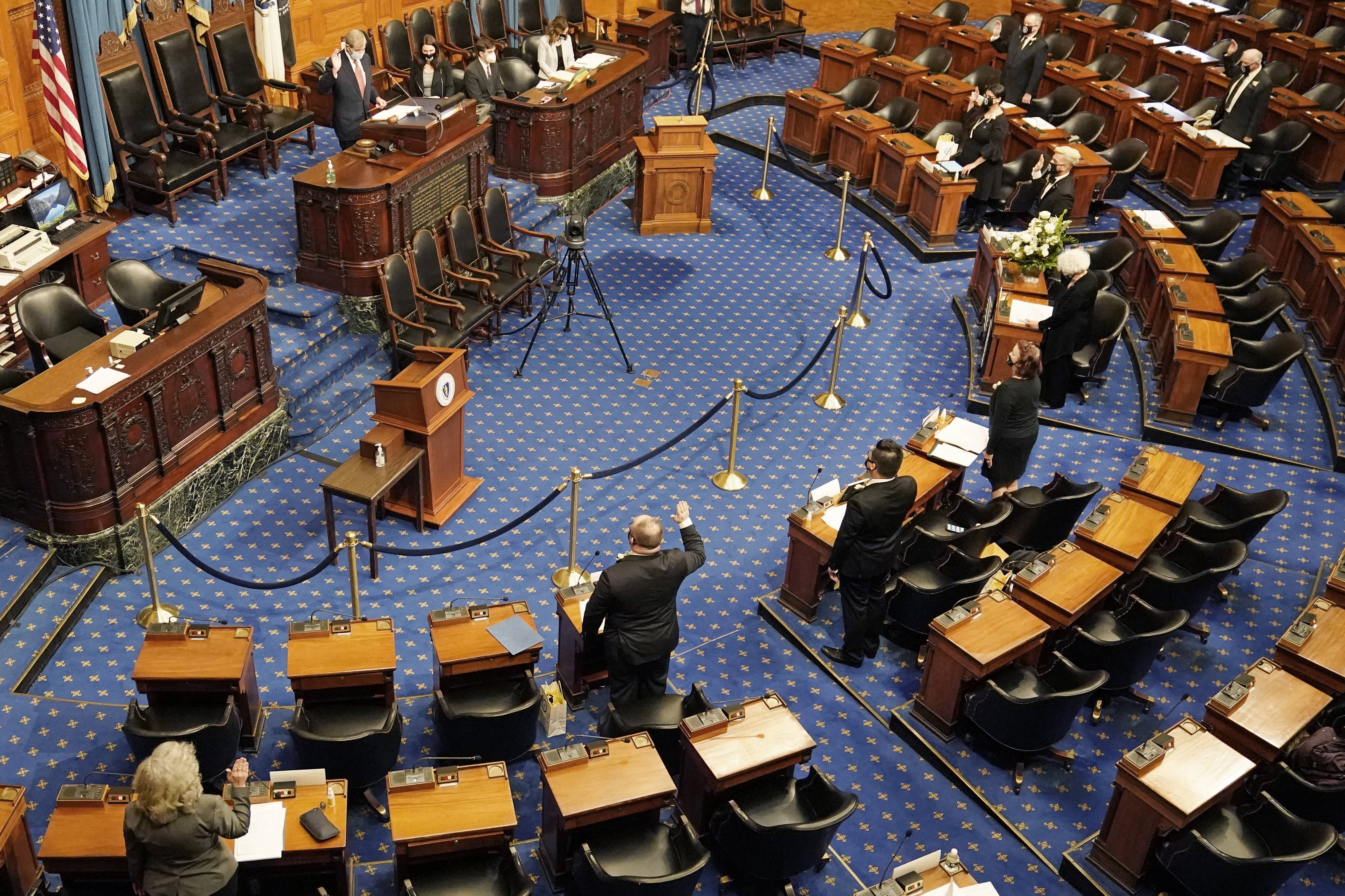 Members of the electoral college are sworn in in Boston on Monday. (Charles Krupa/AP)