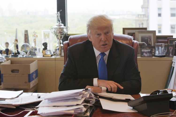 Trump speaks with the AP yesterday during an interview at Trump Tower. (AP/Mary Altaffer)</p>  