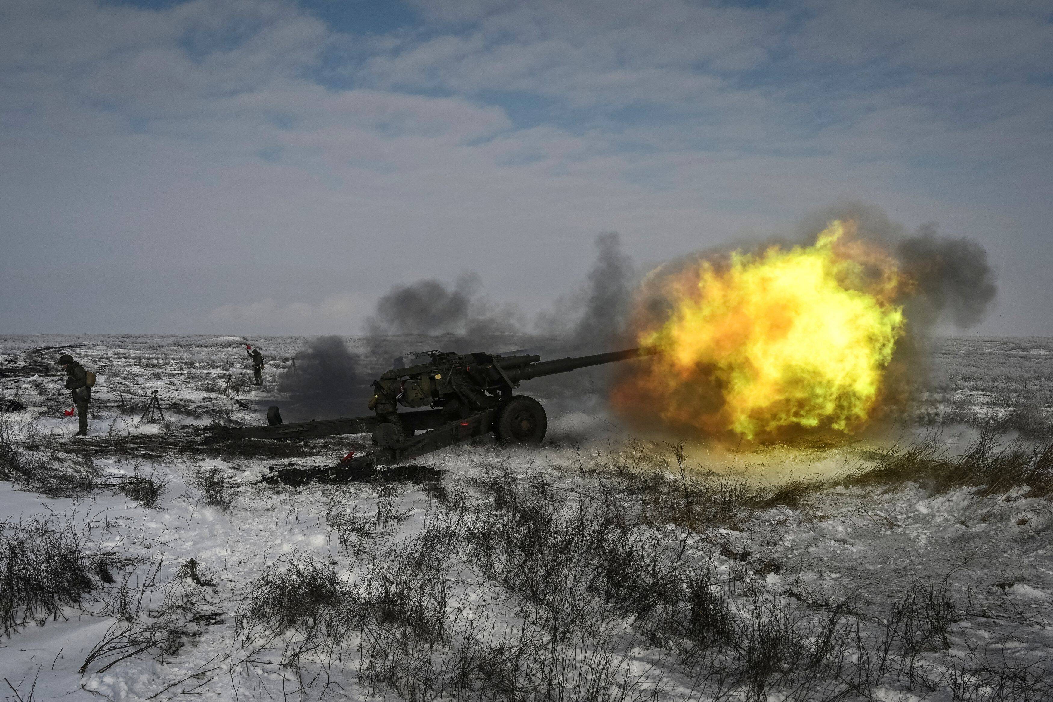 A Russian army service member fires a howitzer during drills at the Kuzminsky range in the southern Rostov region of Russia on Jan. 26. (Sergey Pivovarov/Reuters)