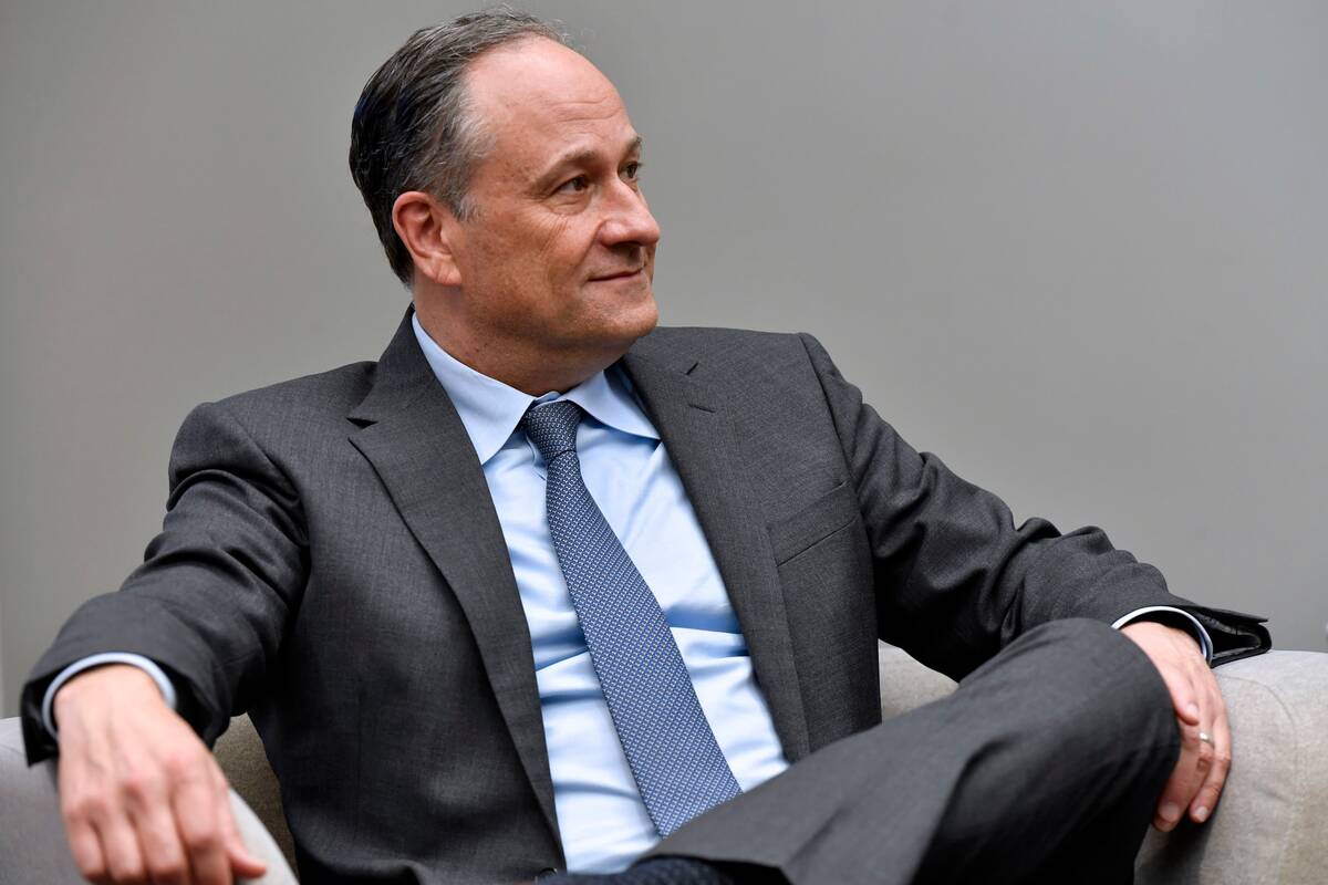 Second gentleman Doug Emhoff listens as he meets with women entrepreneurs for a panel discussion while visiting Mi Casa Resource Center in Denver, on March 11. (Jason Connolly/Pool via AP)