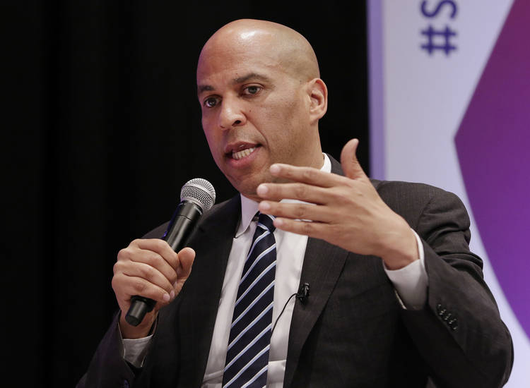 Sen. Cory Booker (D-N.J.) answers questions during a presidential forum held by She the People in Houston. (Michael Wyke/AP)  