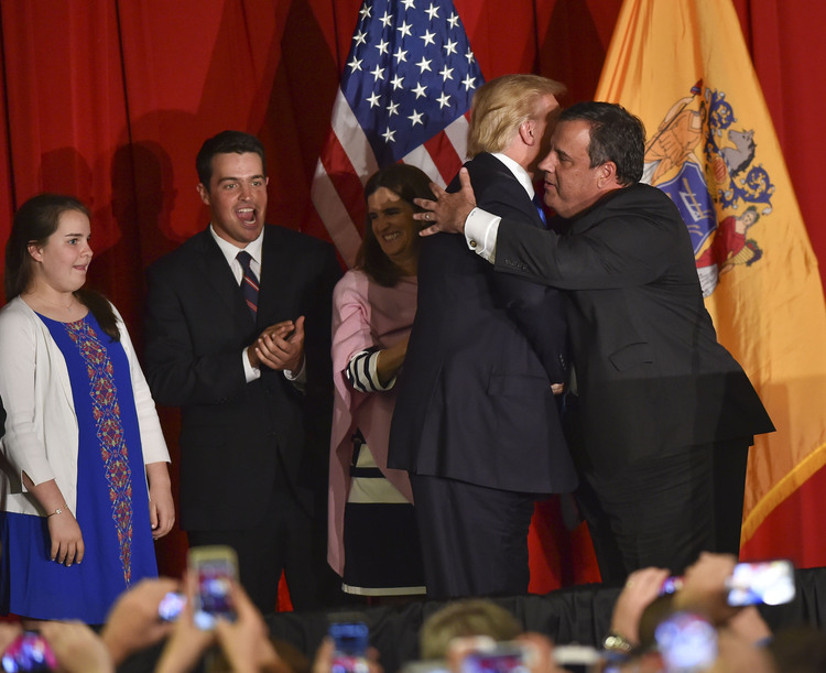 Donald Trump gets a hug from Chris Christie yesterday&nbsp;at the New Jersey National Guard Armory.&nbsp;At left are members of Christie's family.&nbsp;(Photo by Ricky Carioti/The Washington Post)</p>  