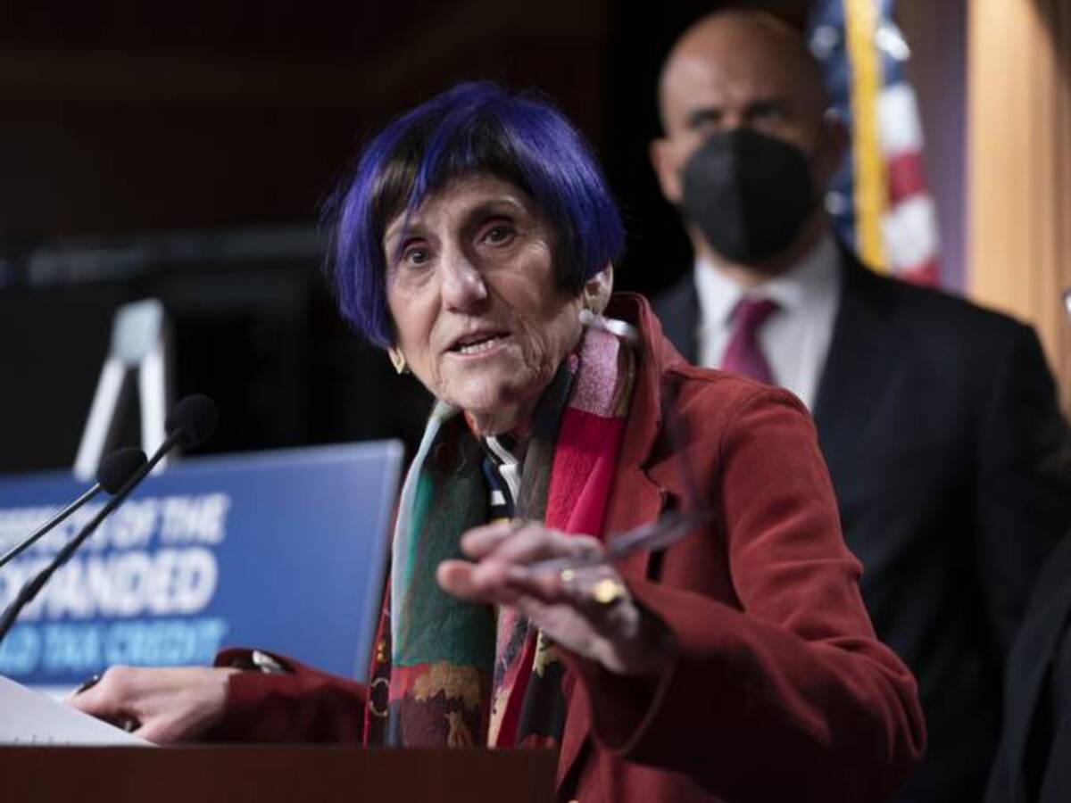 Rep. Rosa L. DeLauro (D-Conn.), the House Appropriations Committee chair, and Sen. Cory Booker (D-N.J.), right, speak about tax credits during a news conference at the Capitol in Washington, D.C., on Feb. 8, 2022. (J. Scott Applewhite/AP)