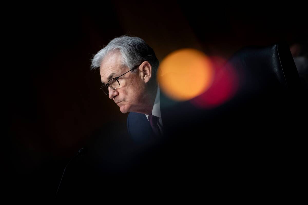 Federal Reserve Chairman Jerome H. Powell listens during his re-nomination hearing before the Senate Banking Committee on Jan. 11. (Brendan Smialowski/Pool via AP)
