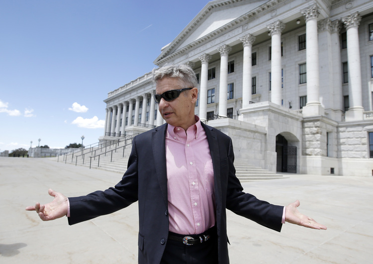 Gary Johnson leaves the Utah State Capitol yesterday after meeting with with legislators.&nbsp;(AP Photo/Rick Bowmer)</p>  
