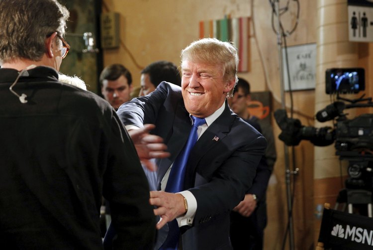 Trump jokes around with MSNBC host Joe Scarborough last year. (Scott Morgan/Reuters)</p>  