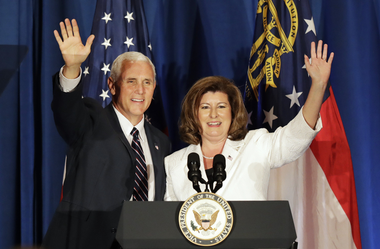 Vice President Mike Pence stumped for Karen Handel in Atlanta on June 9. (David Goldman/AP)</p>  