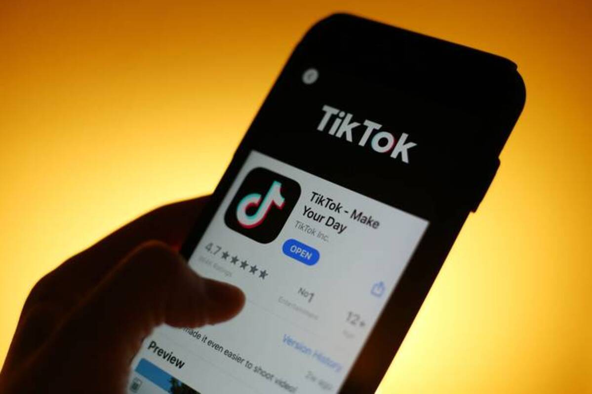 TikTok and other social media companies have been flooded with a combination of propaganda, repurposed images and real footage of the conflict in Ukraine. (Hollie Adams/Bloomberg News)