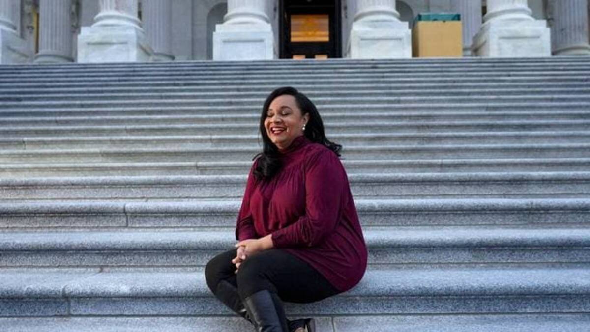 Rep-elect Nikema Williams (D-Ga.) laughs while sitting for a portrait on the steps of the Capitol in Washington, D.C., on Dec. 4, 2020. (Bonnie Jo Mount/The Washington Post)