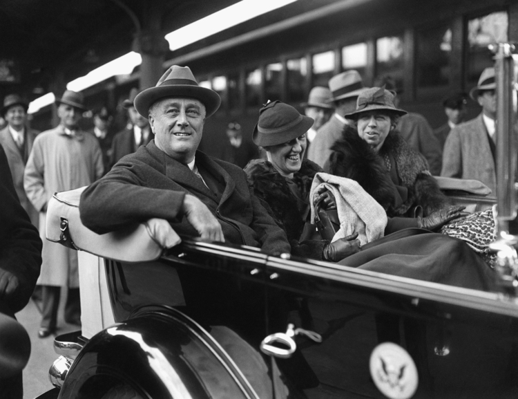 Franklin D. Roosevelt, his secretary Marguerite LeHand, and first lady Eleanor Roosevelt arrive at Union Station in 1933. (AP Photo)</p>  