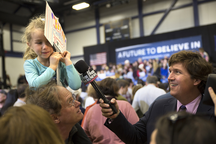 A five-year-old girl is not thrilled to speak to Fox News' Tucker Carlson during a Bernie Sanders rally in New Hampshire. (Lucian Perkins /for WashPost)</p>
